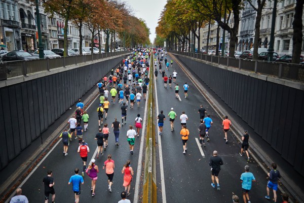 top view of people running road race | 5 Ways to Create Fitness Habits That Actually Stick