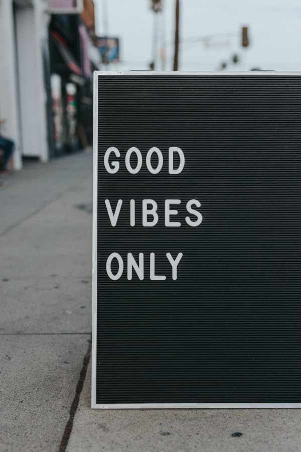 Outdoor sign says good vibes only | What Productivity Means and How to Get Better at It