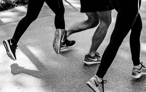 black and white shot of legs running | 5 Ways to Create Fitness Habits That Actually Stick