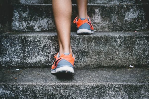 feet-taking-step-up-stairs | How to Define Wellness and Make It Work For You