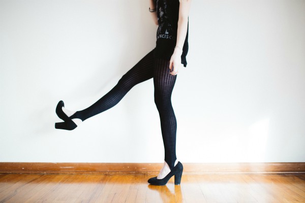 female legs in black tights and heels kicking | Have a Happy Holiday by Sticking to Your Fitness Routine