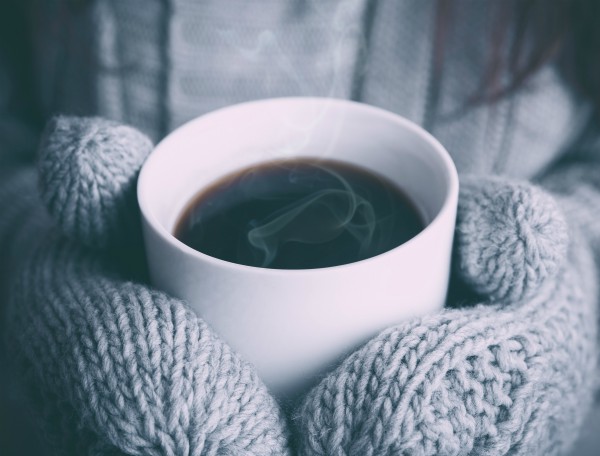 mitten hands holding steaming cup of coffee | These Mindfulness Meditation Exercises Will Change Your Day