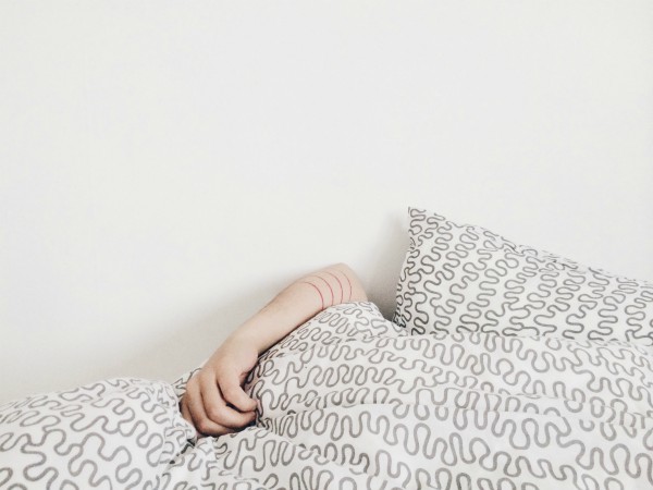 arm reaching out from covers | This Meditation for Sleep is Key to a Better Night  https://positiveroutines.com/meditation-for-sleep-tonight/