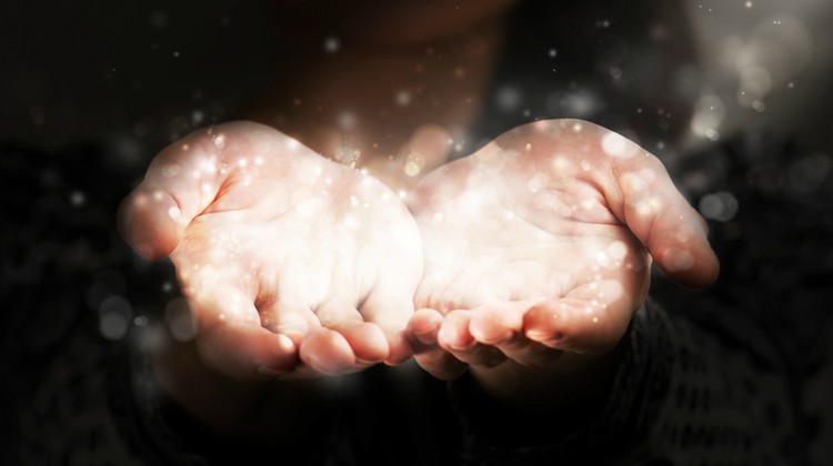 hands open glowing with light | How to Define Gratitude + 5 Ways To Get The Benefits  https://positiveroutines.com/define-gratitude/