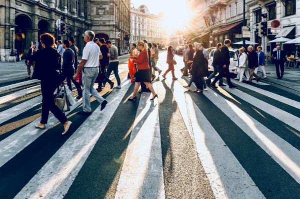 busy crosswalk people walking example of light exercise | New Research on Light Exercise Might Make You Move More