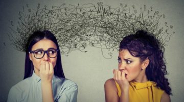 two women looking at each other anxiety | Mindfulness for Anxiety Works. Here Are 2 Ways to Try it. https://positiveroutines.com/mindfulness-for-anxiety/ 