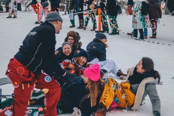 people in finland sledding happy | Top 5 Insights from World Happiness Report 2018