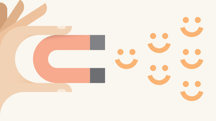 illustration of hand holding magnet attracting positivity smiles | Top 5 Insights from the World Happiness Report 2018