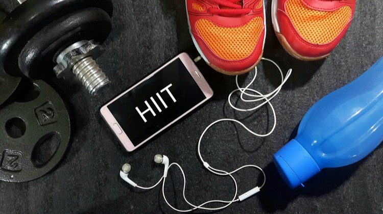 HIIT illustration sneakers weight waterbottle | Top Fitness Apps for Effective HIIT Workouts