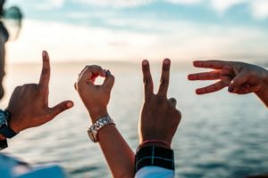 hands spelling out love | Suck at Handling Stress? These are the 3 Habits You Need