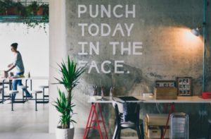 punch today in the face on wall in office | What You Need to Know about Stress and the Brain