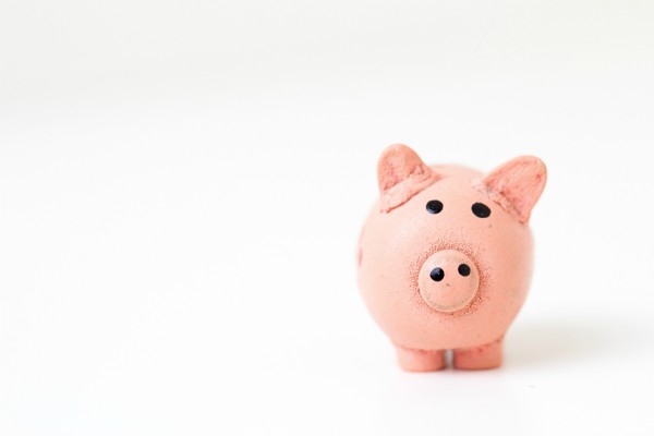 vintage piggybank on white background | The Research-Backed Guide to Money and Happiness