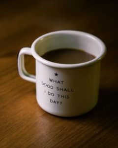coffee cup that says what good shall I do this day | Can Staying Positive Increase Your Productivity? https://positiveroutines.com/staying-positive-increase-productivity/