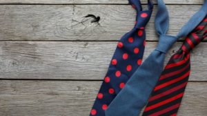 three mens ties against wooden background | 11 Good Father's Day Gifts to Make Dad More Productive https://positiveroutines.com/good-fathers-day-gifts-2018/