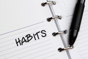 HABITS word written on notebook | 75 Great Apps That Will Change Your Life https://positiveroutines.com/great-apps-for-change/ 