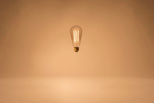 lightbulb against plain background | Can a Productivity App Teach You How to Be More Organized? https://positiveroutines.com/how-to-be-more-organized-app/