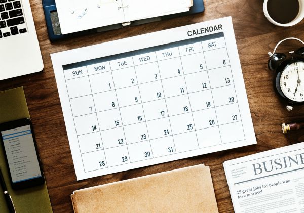 paper calendar overlay business concept | 5 Productivity Hacks for Ultimate Email Efficiency https://positiveroutines.com/productivity-hacks-email/ ‎