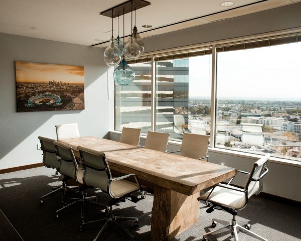 sunlight coming through conference room | Increase Productivity at Work in This Simple Way  https://positiveroutines.com/increase-productivity-at-work/ 