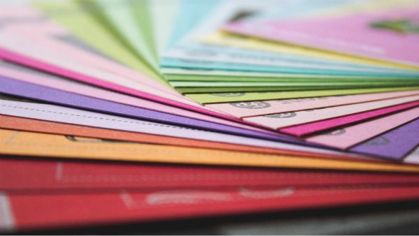 colorful folders | The Best Decluttering Tips for a Productive Workspace https://positiveroutines.com/decluttering-tips/