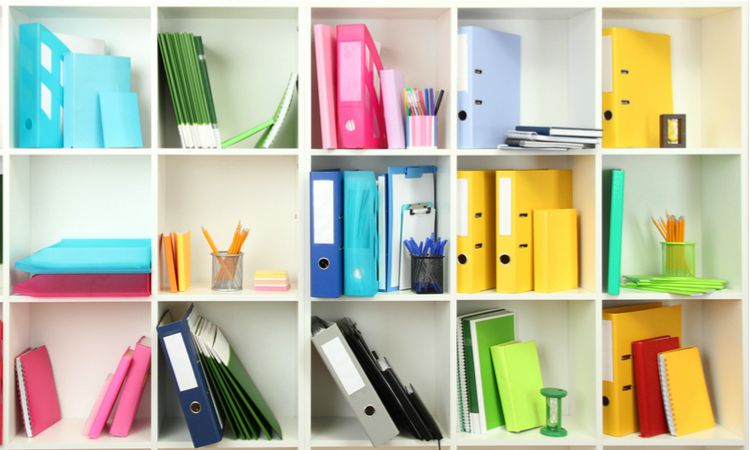 multi color filing system organization concept | The Best Decluttering Tips for a Productive Workspace https://positiveroutines.com/decluttering-tips/