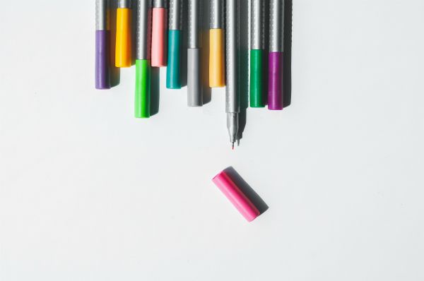 colorful pens with pink cap off | In Time for the Holidays: How to Take Breaks Effectively  https://positiveroutines.com/how-to-take-breaks/