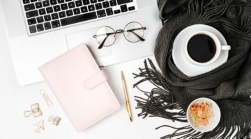 laptop planner with blanket glasses coffee fall concept | No Distractions: 5 Ways to Focus This Fall