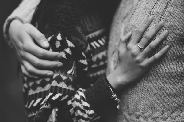 black and white close up of two people in sweaters hugging | This Is How To Express Gratitude https://positiveroutines.com/express-gratitude/