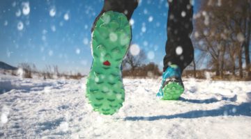 close up of sneaker running in snow | 67 Healthy Mind and Body Tips to Last You All Winter https://positiveroutines.com/healthy-mind-and-body-tips/