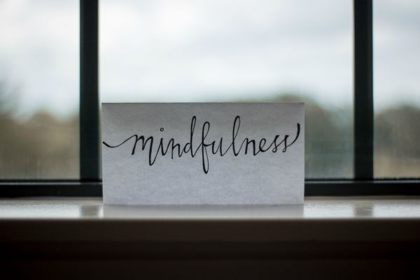 sheet of paper in front of window reads mindfulness | A Healthy Morning Routine For The Best 2019 https://positiveroutines.com/healthy-morning-routine/