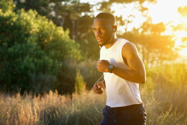 determined male running outdoors | Starting a Workout Routine? Here's How to Make it Happen https://positiveroutines.com/starting-a-workout-routine/