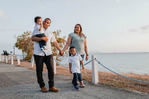 family of four walking along lake | 11 Productive Things to do With Your Free Time https://positiveroutines.com/productive-things-to-do/