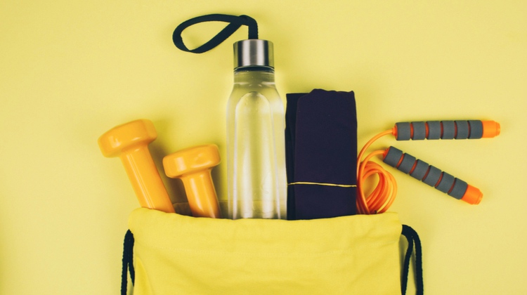 yellow-fitness-equipment-on-exercise-mat - Positive Routines