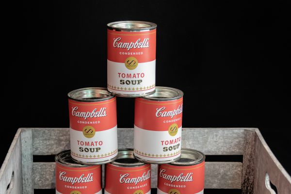 stack of soup cans | 11 Kind Acts To Brighten Someone's Day https://positiveroutines.com/kind-acts/
