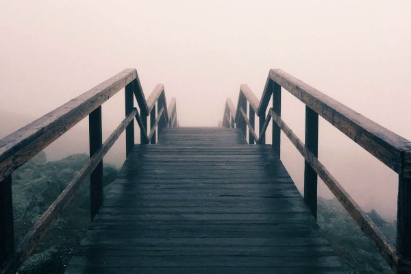 dark wooden stairs covered in fog | What is Procrastination? Causes, Effects, & How to Stop Procrastinating https://positiveroutines.com/what-is-procrastination/