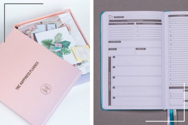 happiness planner in open keepsake box beside open panda planner with blue ribbon | Productivity on Paper: The Happiness Planner vs. Panda Planner https://positiveroutines.com/the-happiness-planner-panda-planner