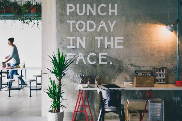 office wall says punch today in the face | How to Stop Feeling Guilty For Not Getting "Enough" Work Done https://positiveroutines.com/stop-feeling-guilty/