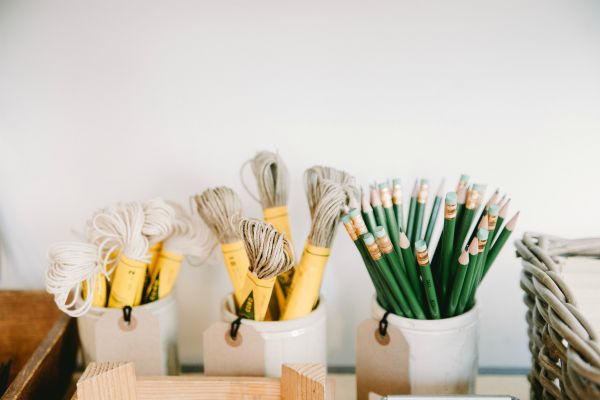 pencils and craft materials organized in mugs | What Is Organization? How to Declutter and Organize Your Life https://positiveroutines.com/what-is-organization/