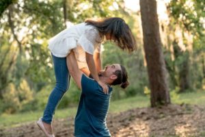 father and young daughter outdoors | 15 Father's Day Quotes to Make Dad Happy This Year https://positiveroutines.com/fathers-day-quotes/
