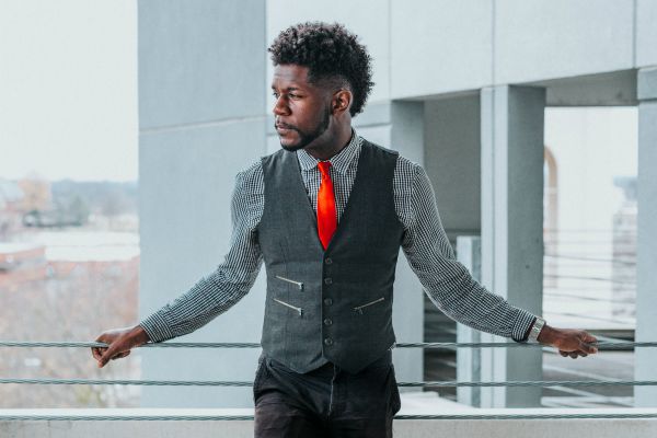 professional and pensive male in suit vest | Why You Don't Need a Time-Management Plan  https://positiveroutines.com/time-management-plan/
