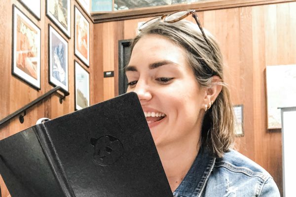 Christina smiling with Panda Planner | A Popular Instagrammer Shares Her Top Tips to Get Organized This Fall https://positiveroutines.com/tips-to-get-organized/