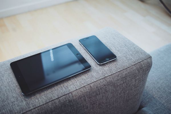 powered down devices on sofa | The Happiness-Boosting Magic of Evening Routines https://positiveroutines.com/evening-routines/
